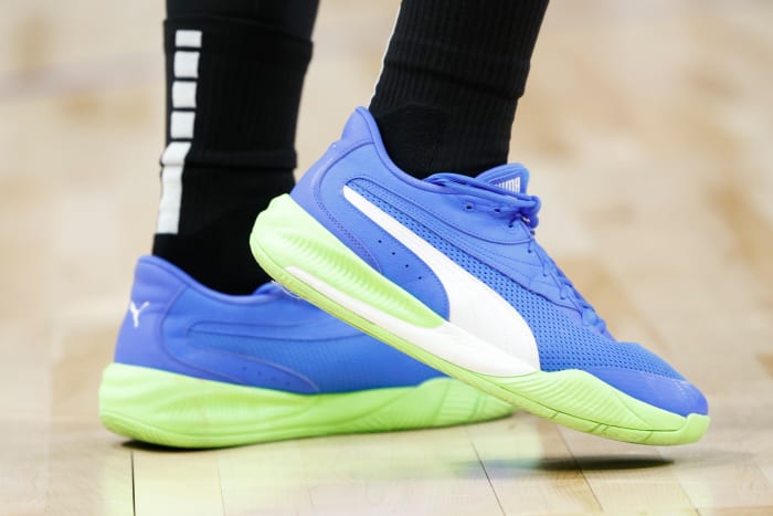 Blue and green Puma Fusion Nitro shoes.